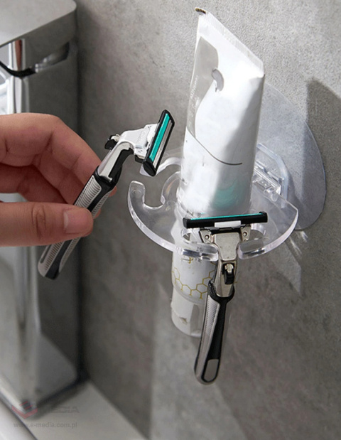 Toothbrush/paste/razor holder